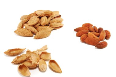 Almonds grains are isolated on a white background clipart