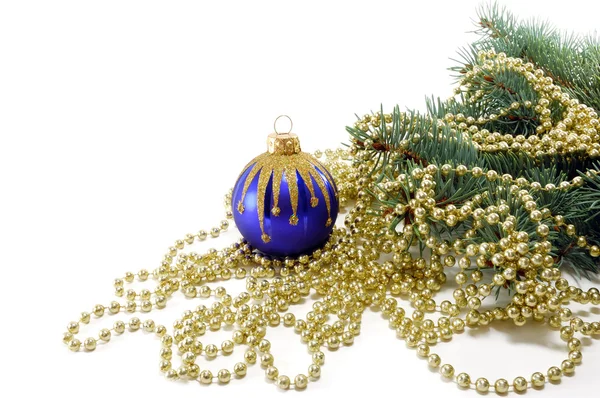 Fur-tree with a Christmas ball and a beads — Stock Photo, Image