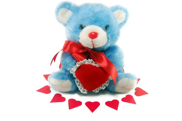 用一个红色的蝴蝶结的心 孤立在白色背景上的玩具熊 — 图库照片