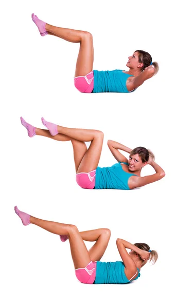 Young woman do exercises for abdominal muscles Royalty Free Stock Images