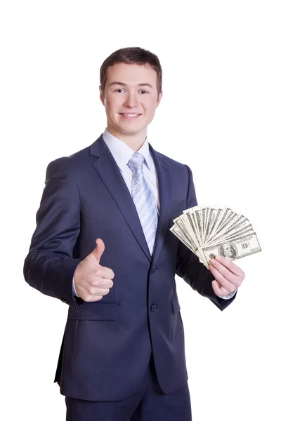 Affärsman håller pengarna i sin hand — Stockfoto