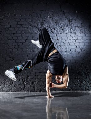 Young strong man break dance clipart