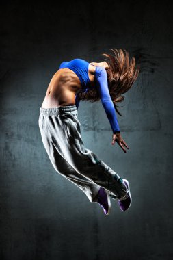 Young woman dancer jumping clipart