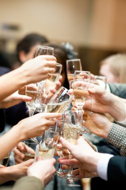 Toast. Many hands with champagne glasses. clipart