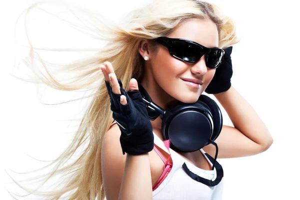 Young woman with big headphones — Stockfoto