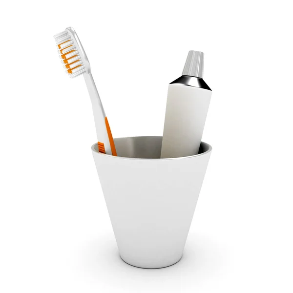 Escova de dentes e pasta na tampa — Fotografia de Stock