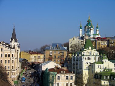 Andriyivsky uzviz (famous street of souvenirs and craft) with St. Andrew's church and Richard's castle, Kyiv, Ukraine clipart