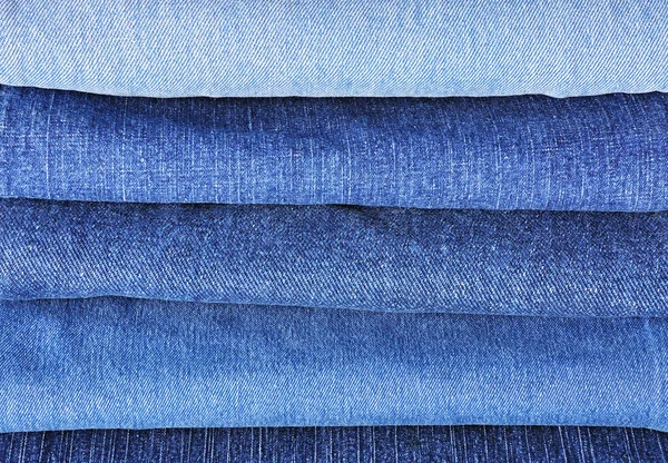 Jeans empilhar fundo — Fotografia de Stock