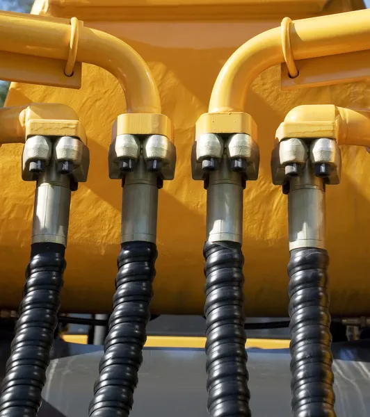 stock image Excavator hydraulic tubes system