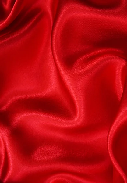 Hladké elegantní červené hedvábí — Stock fotografie