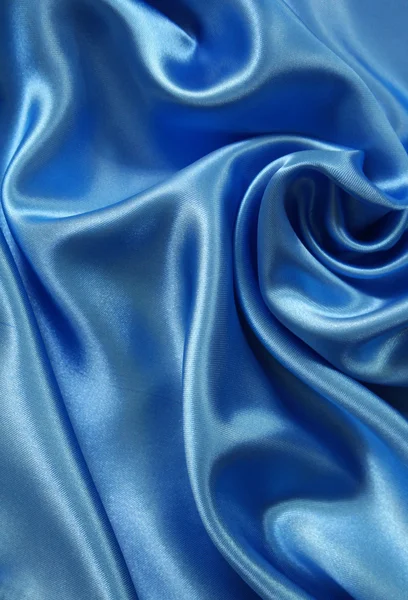 Soepele elegante donker blauwe zijde als achtergrond — Stockfoto