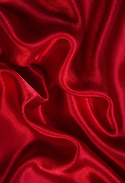 Гладкий елегантний червоний шовк як фон — стокове фото