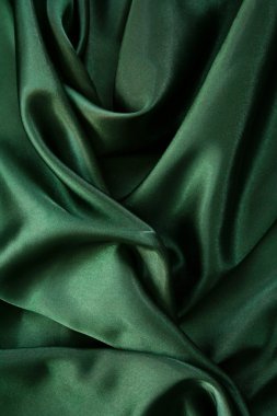 Smooth elegant dark green silk as background clipart