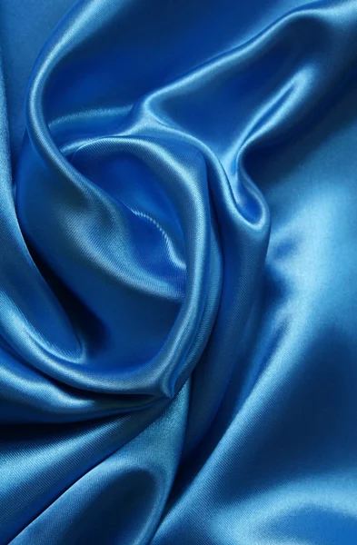 Гладкий елегантний темно-синій шовк як фон — стокове фото