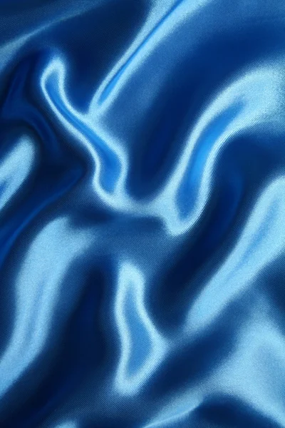 Hladké elegantní tmavě modré hedvábí jako pozadí — Stock fotografie