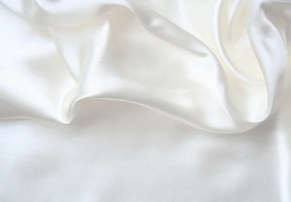Sima, elegáns fehér selyem esküvői háttereként — Stock Fotó