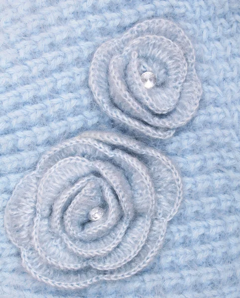 Flores de lana azul sobre fondo de lana azul — Foto de Stock