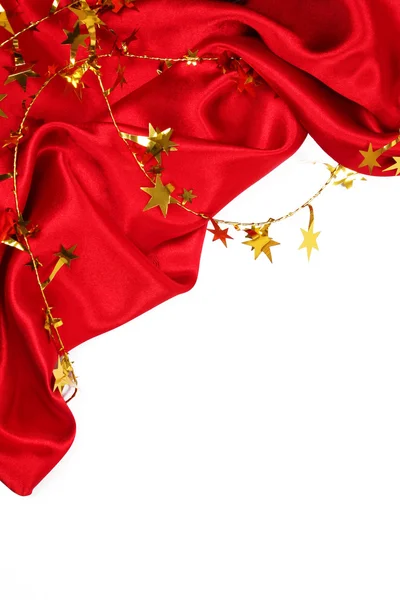 Hladké červeného hedvábí se zlatými hvězdami jako rekreační zázemí — Stock fotografie