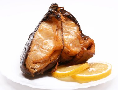 Smoke-cured catfish with lemon clipart