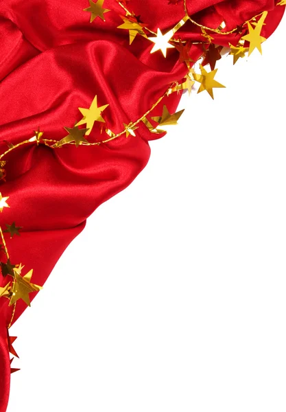 光滑的红色丝绸与金黄星作为节日背景 — 图库照片