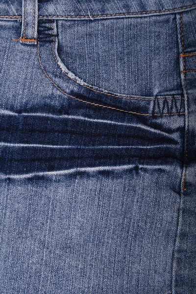 Tejido vaquero azul con bolsillo como fondo — Foto de Stock