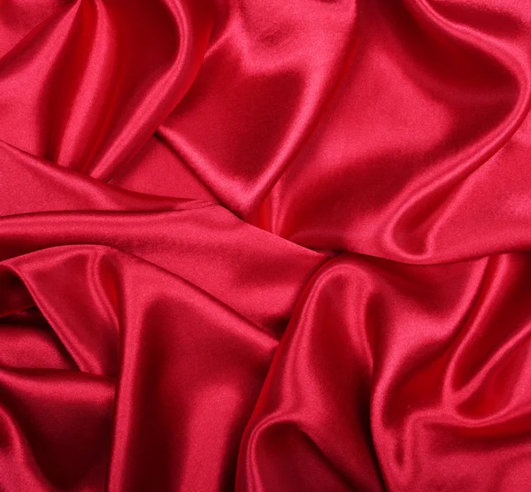Glatte elegante rote Seide als Hintergrund — Stockfoto