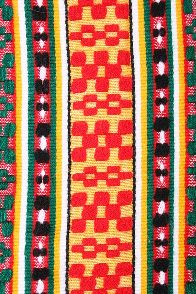 Red, yellow and green knitted textured as background — Stock Photo, Image