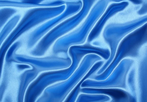 stock image Smooth elegant blue silk as background