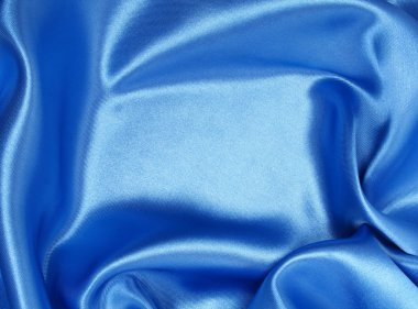 Smooth elegant blue silk as background clipart