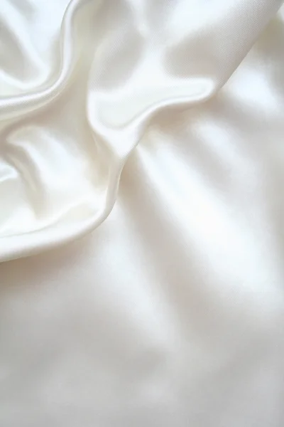 Glatte elegante weiße Seide kann als Hintergrund verwendet werden — Stockfoto
