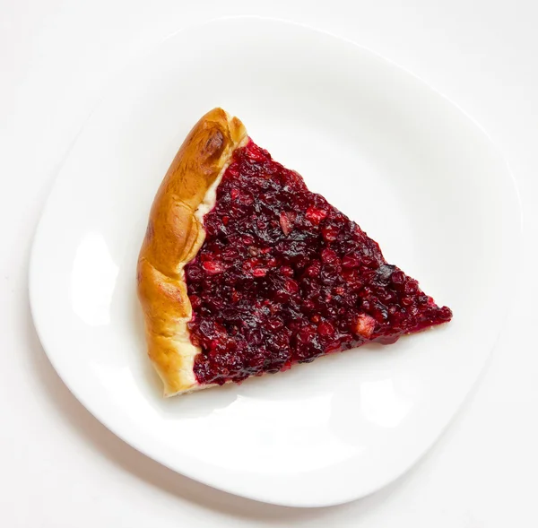 Piece of apple and cowberry jelly pie — Stock Photo, Image