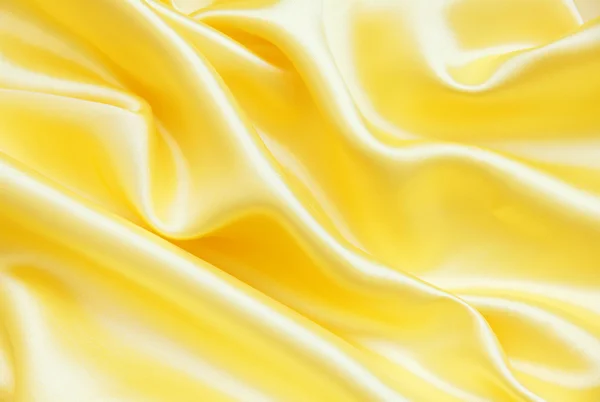 Liscio elegante seta dorata come sfondo — Foto Stock