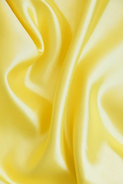 Smooth elegant golden silk as background — Stock Photo, Image