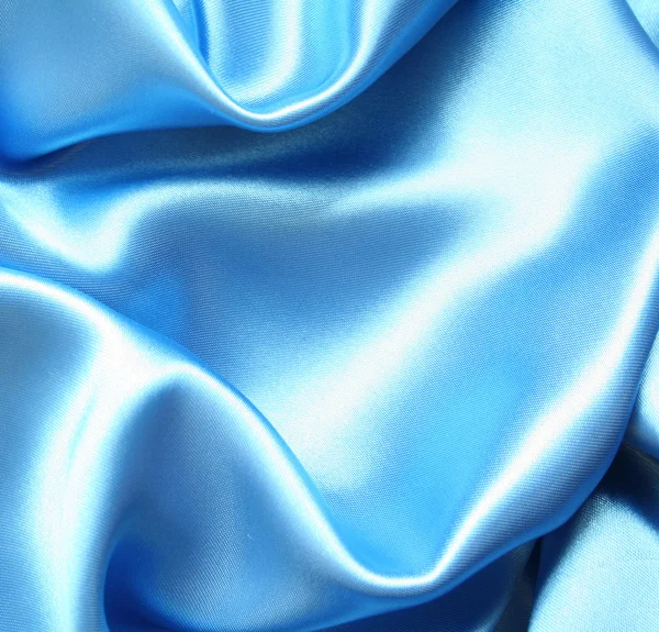 Гладкий елегантний синій шовк як фон — стокове фото