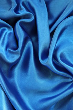 Smooth elegant blue silk as background clipart