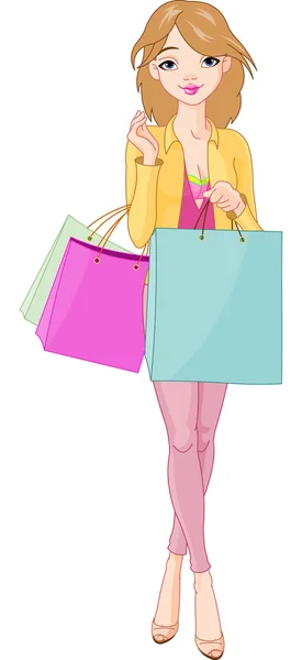 Dívka s nákupními taškami — Stockový vektor