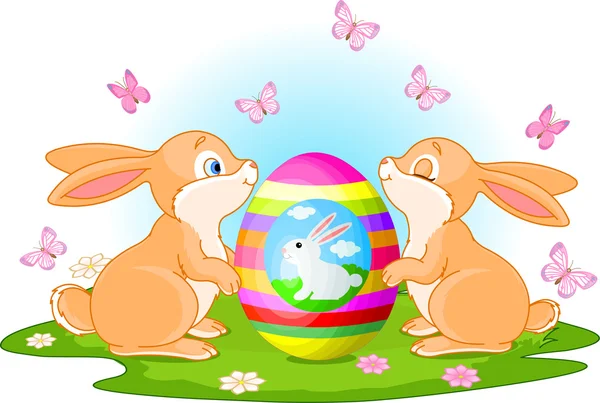 Bunnies holds Easter Egg — Stock Vector