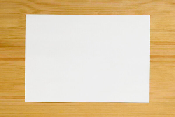 A4, на деревянном столе
.