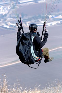 Taking-off Paraglider from the Gilboa mountains, Israel clipart