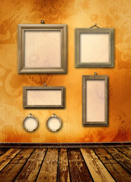 Old gold frames Victorian style on the wall in the room — Stock Photo, Image