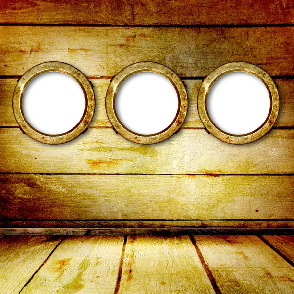 Grunge portholes on the ancient wooden background — Stock Photo, Image