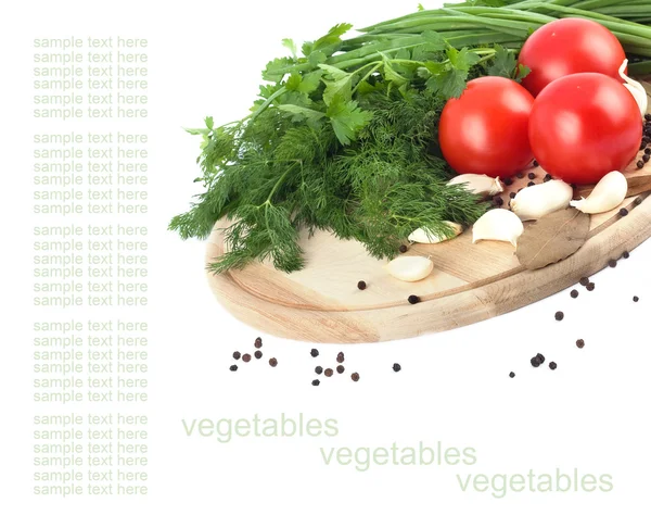 Raw vegetables on cutting board on white background (with sample — Stock Photo, Image