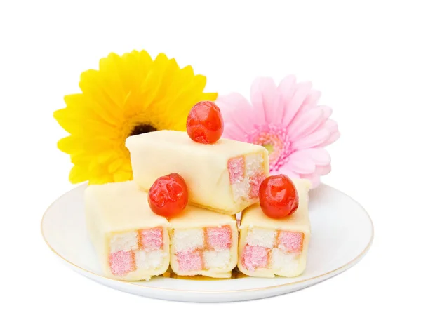 Tasty cakes with flowers — Stock Photo, Image