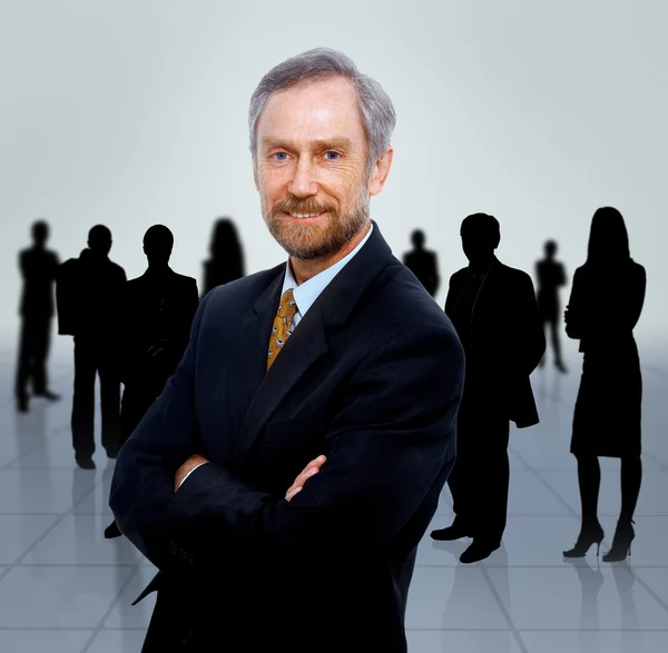 Uomo d'affari e il suo team isolato su uno sfondo bianco — Foto Stock