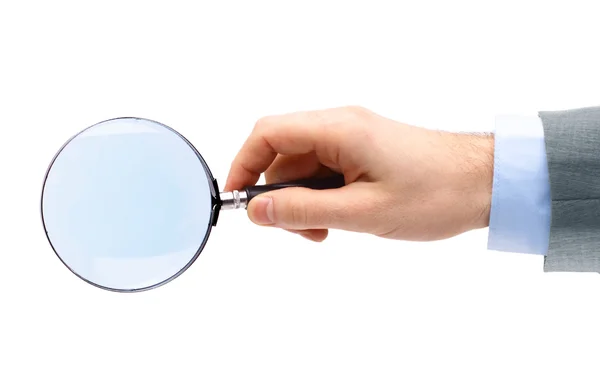 Vergrootglas in de hand geïsoleerd op witte achtergrond — Stockfoto