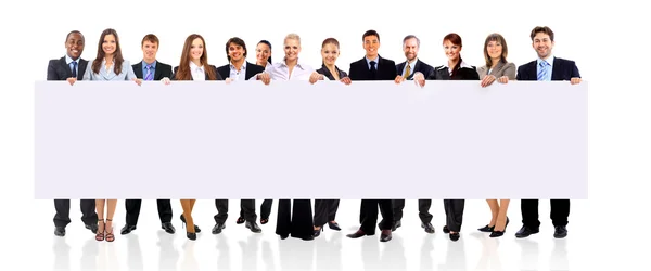 Equipe de negócios com um banner isolado sobre um fundo branco — Fotografia de Stock
