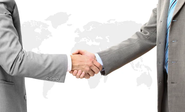 Dois empresários dando aperto de mão no fundo branco — Fotografia de Stock
