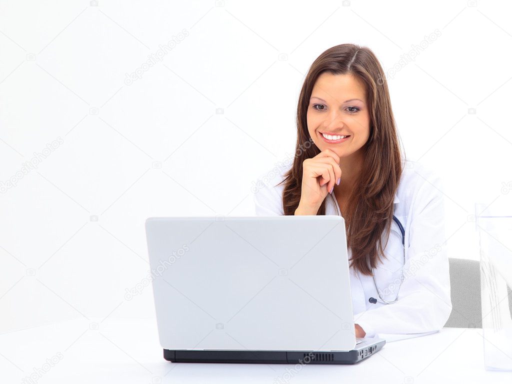 Businesswoman working at desk, isolated on white.