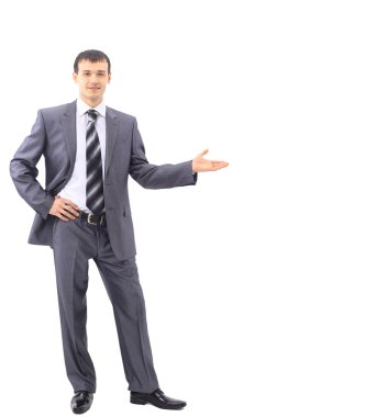 A portrait of a young businessman holding his arm out presenting something clipart