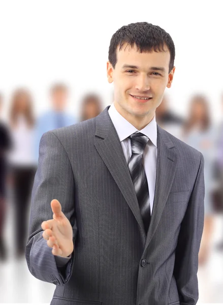 Empresário dando mão para aperto de mão, isolado em branco — Fotografia de Stock
